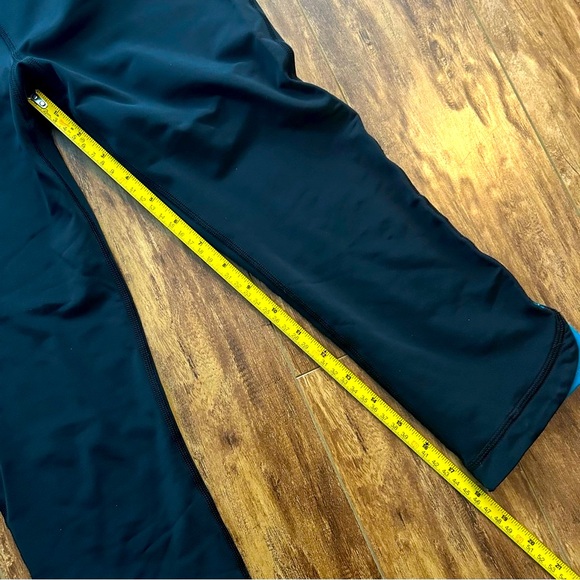 EUC Under Armour black capri yoga pants turquoise blue waistband leggings - Picture 5 of 5